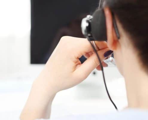 Customer service representative reporting tax and benefit cheats as part of the CRA Leads Program, discussed in KR Law Firm's blog post - Tax Law Firm in Toronto